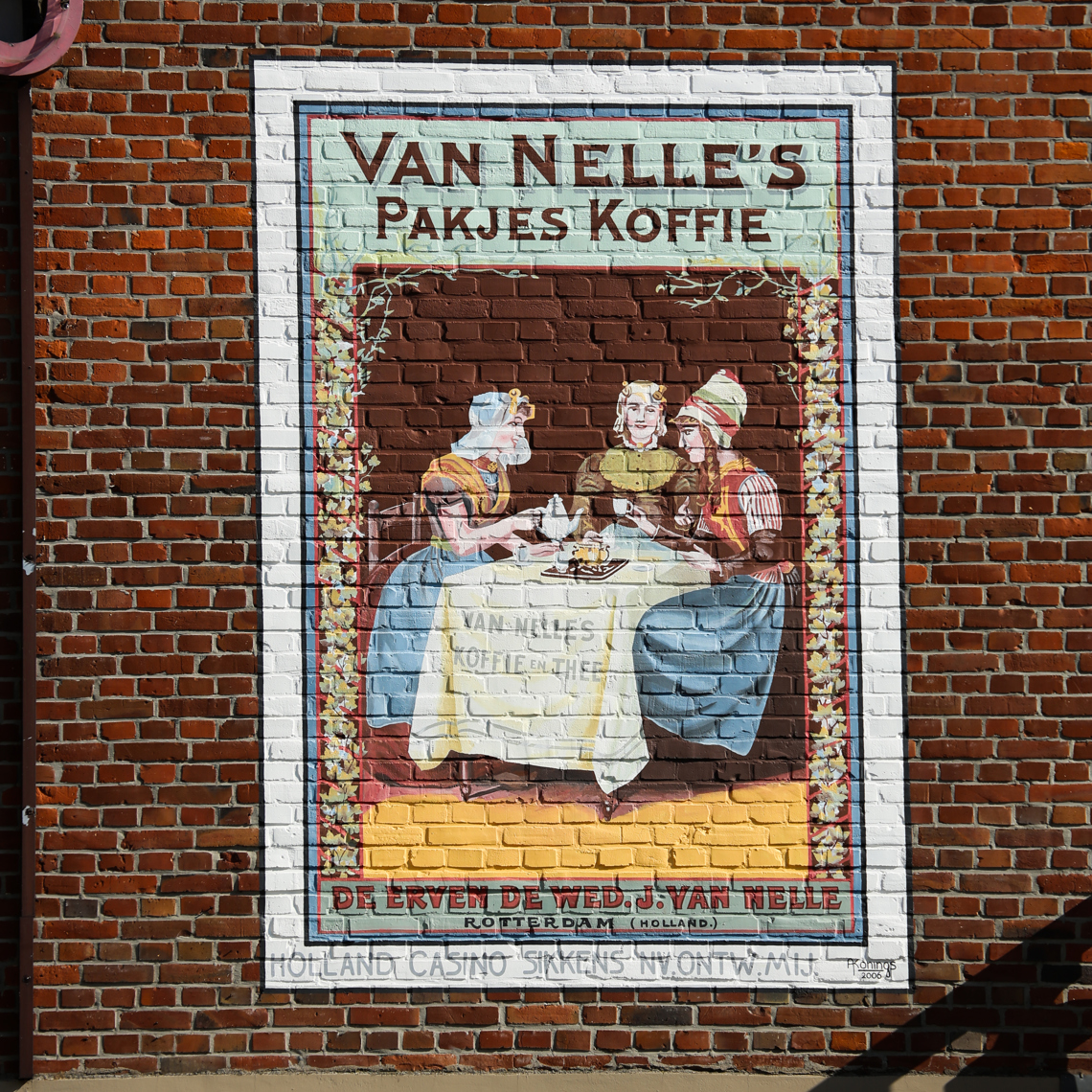 Tekens aan de Wand (muurreclame Van Nelle's Pakjes Koffie) met muur en trap in Valkenburg aan de Geul