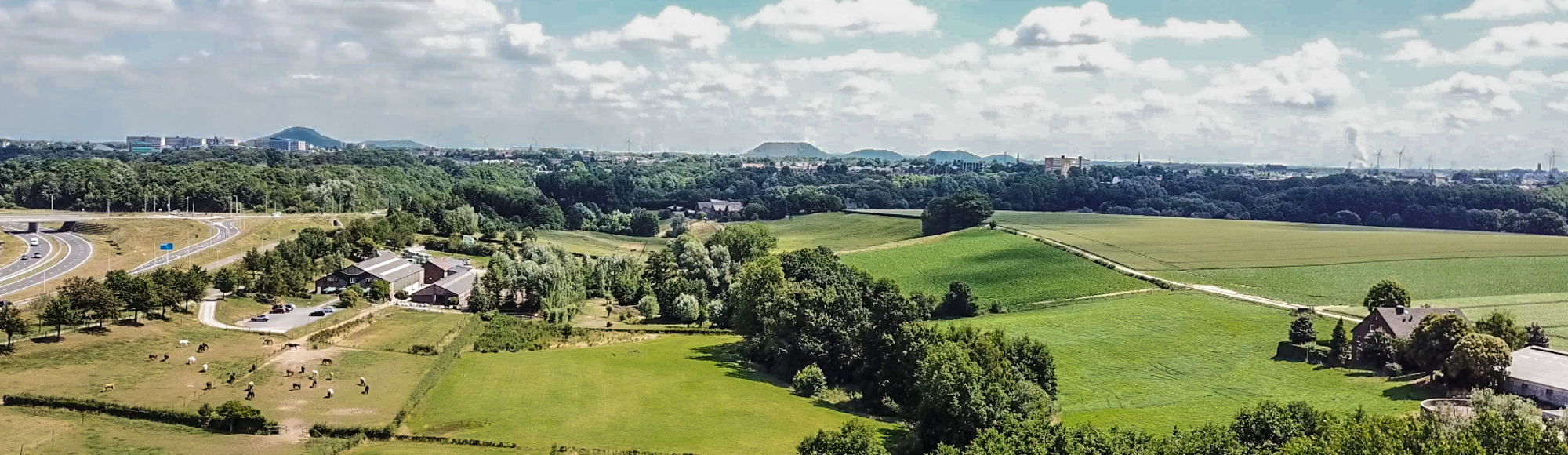 Een uitzicht over het groene buitengebied van Parkstad